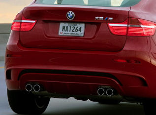 Rear of an SUV with twin exhaust outlets each side
