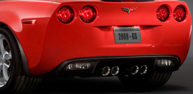 Quad centre tips on a red sports car